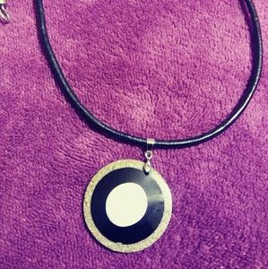 Leather string necklace with charm